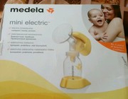 Продам молокоотсос Medela mini electric
